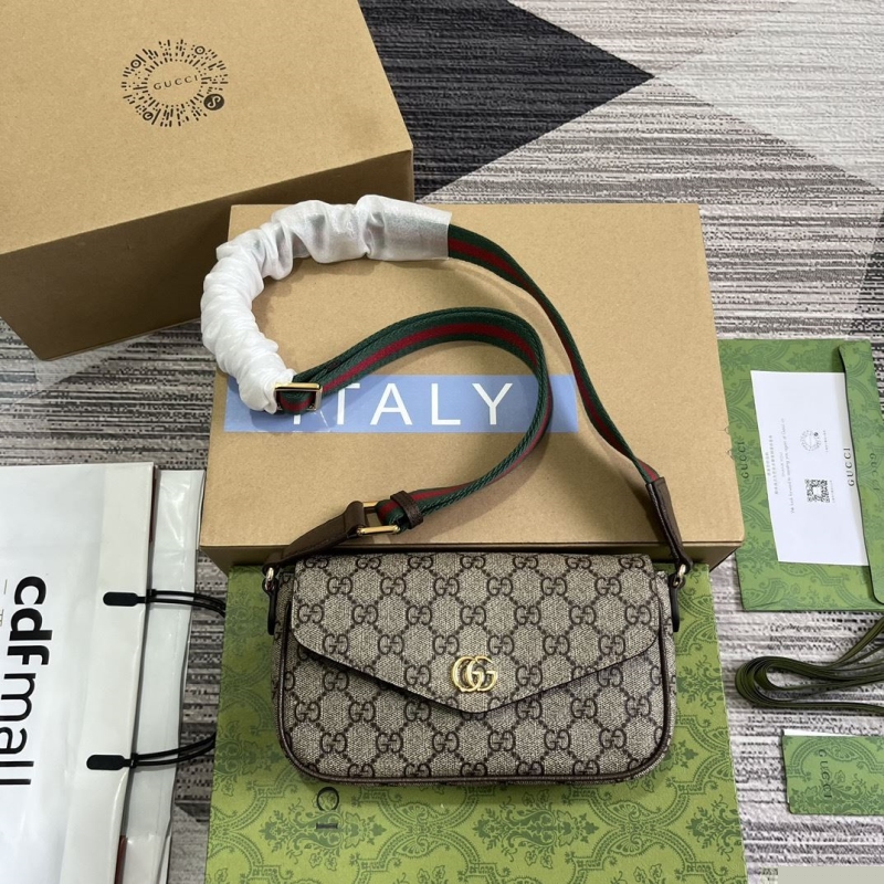 G*u*i top handle bags